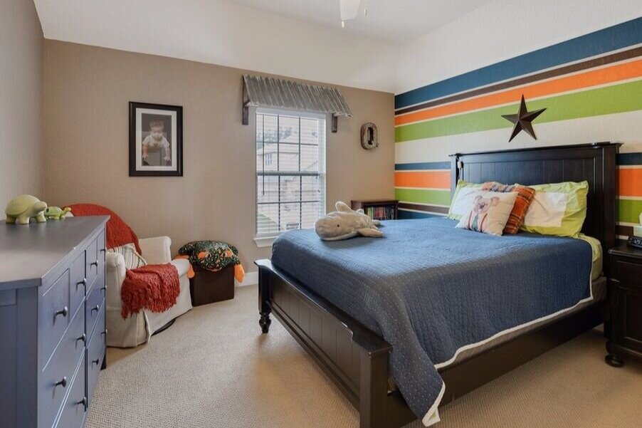 Boys Room with striped accent wall by Renee Yee Interiors